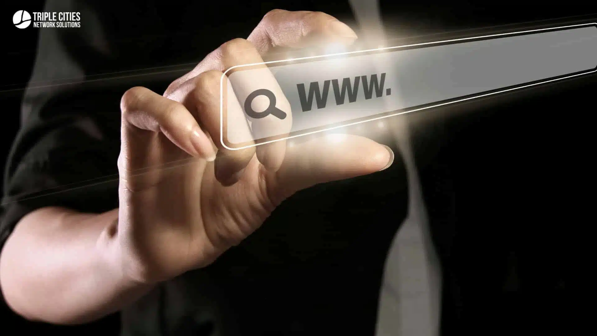 During the Quarterly Technology Business Reviews, a person holds an illuminated search bar with "WWW." displayed under a magnifying glass icon, symbolizing the in-depth insights provided. This overview will delve into the latest trends and innovations from New York IT, highlighting its pivotal role in shaping technology strategies and enhancing business performance.